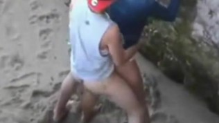 Naughty couple fucking on public beach