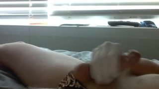 Sissy whore cums while stroking tiny sissy clit with latex gloves